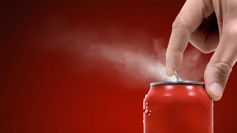 Popping can tab with condensation